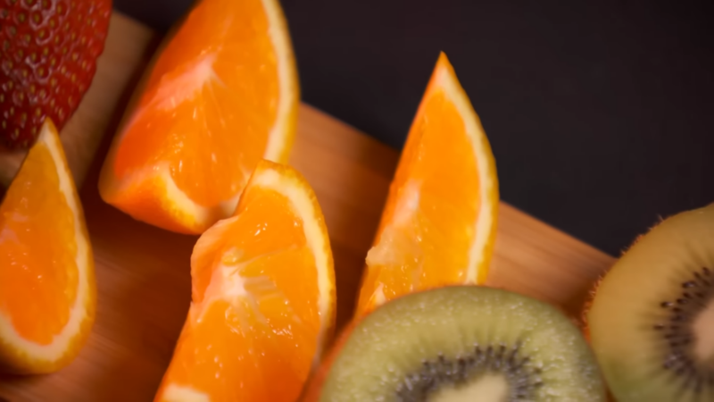 Fresh Oranges, Strawberries, and Kiwi Fruits - Vibrant Natural Sources of Vitamin C